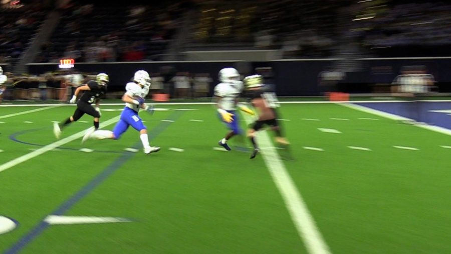 FHS quarterback Brandon Miyazono runs in for a touchdown against Royce City Bulldogs.