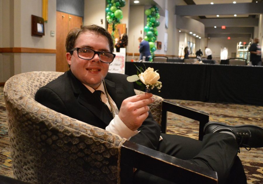 Daniel with prom rose.