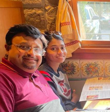 Senior Madhumita Manthri and her father, whom introduced her to the farm, sparking her interest of the environment, at a restaurant. (Photo Courtesy by Madhumita Manthri)